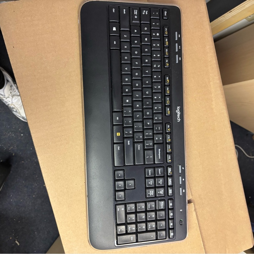Logitech Black Full-Size Wireless Keyboard with Integrated Palm Rest.Multiple